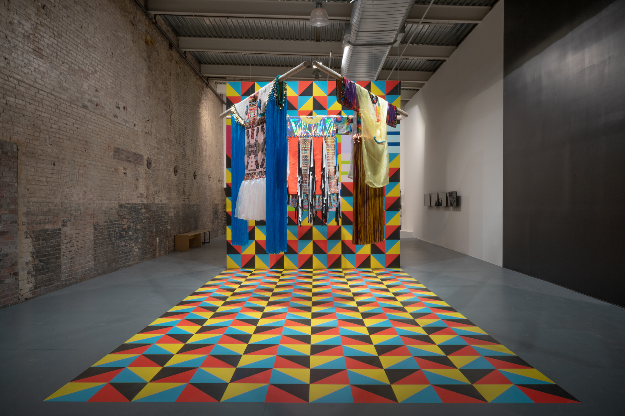 Photograph of Jeffrey Gibson works as installed in the exhibition 'Suffering from Realness' at MASS MoCA.